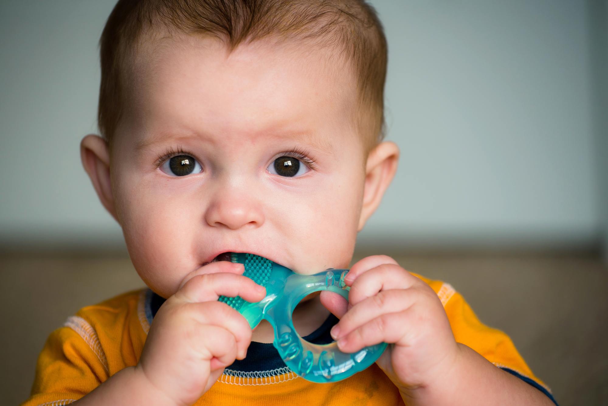 Teething Pains: Signs, Symptoms, and Solutions for Your Teething Infant